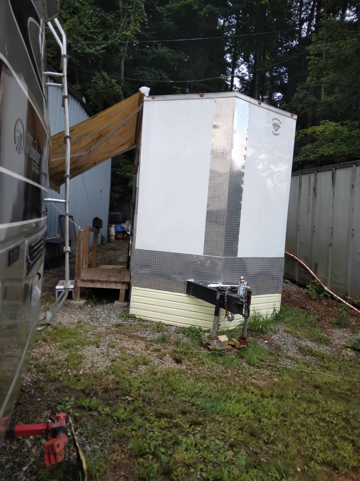 26' V nose x 8.5 wide x 9' ceiling.