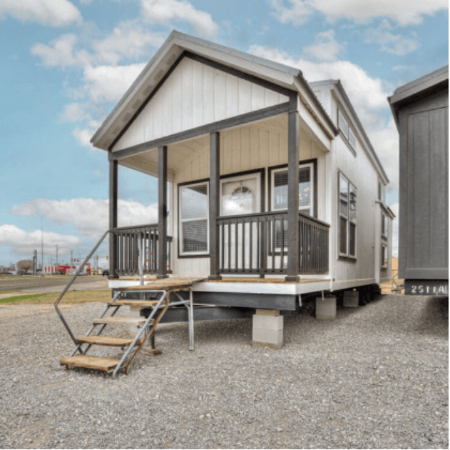 Fully finished 1-bed, 1-bath tiny home built on a mobile trailer chassis.
