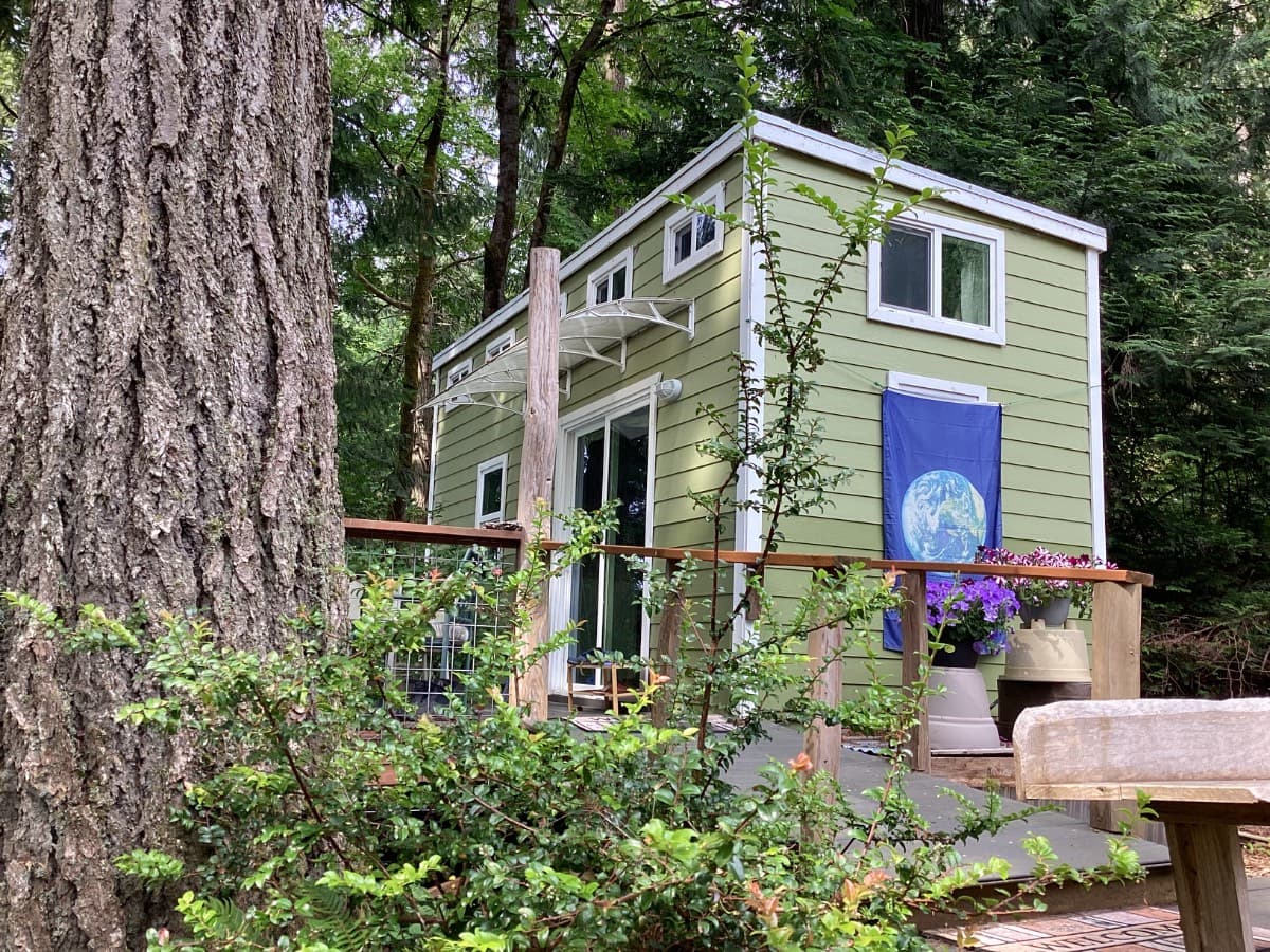 Dual loft tiny house on wheels, abundant light and high ceilings.