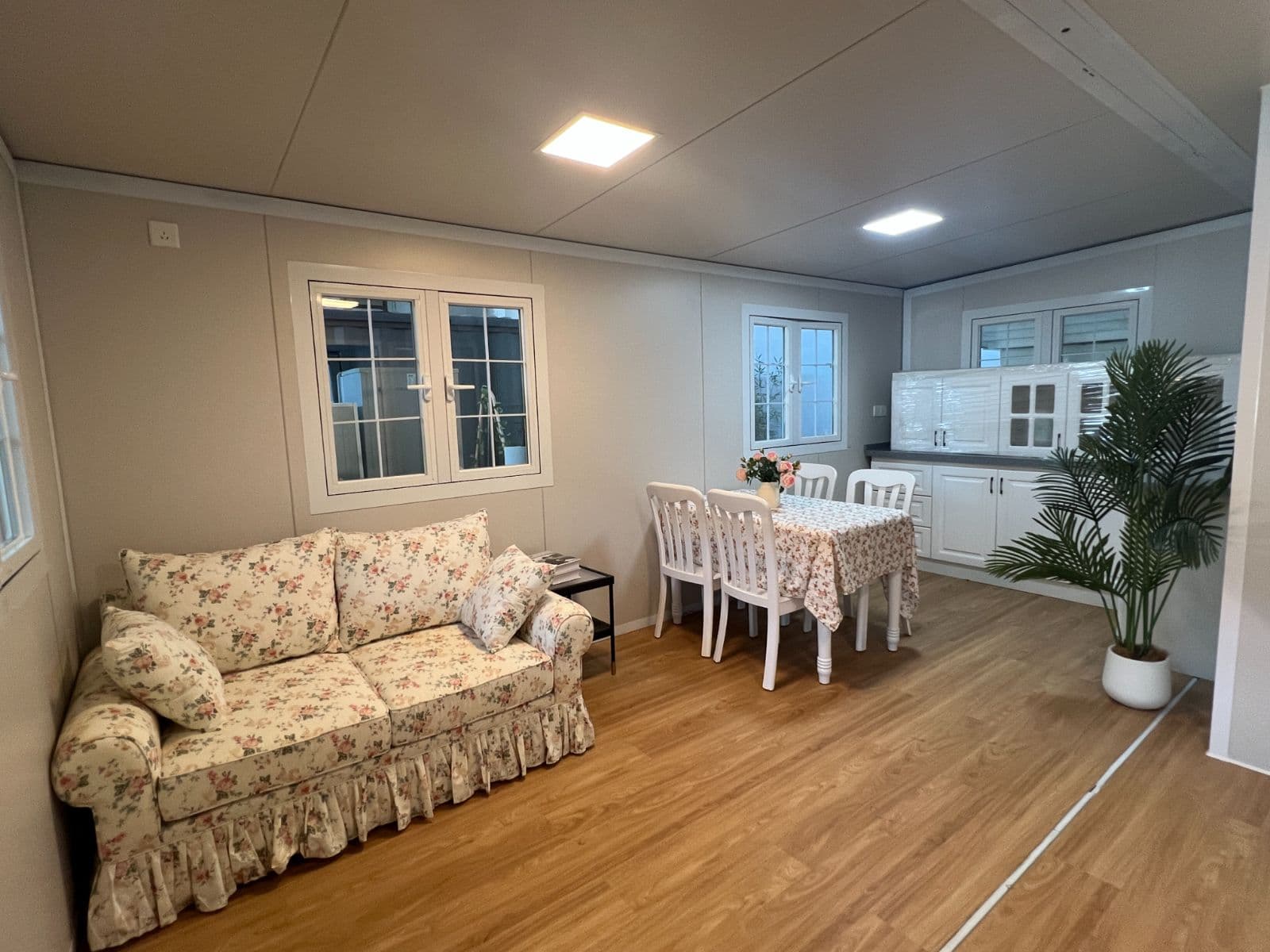 A 2-bedroom, 1-living-room cozy home in a 20-foot garden-style design - Image 2