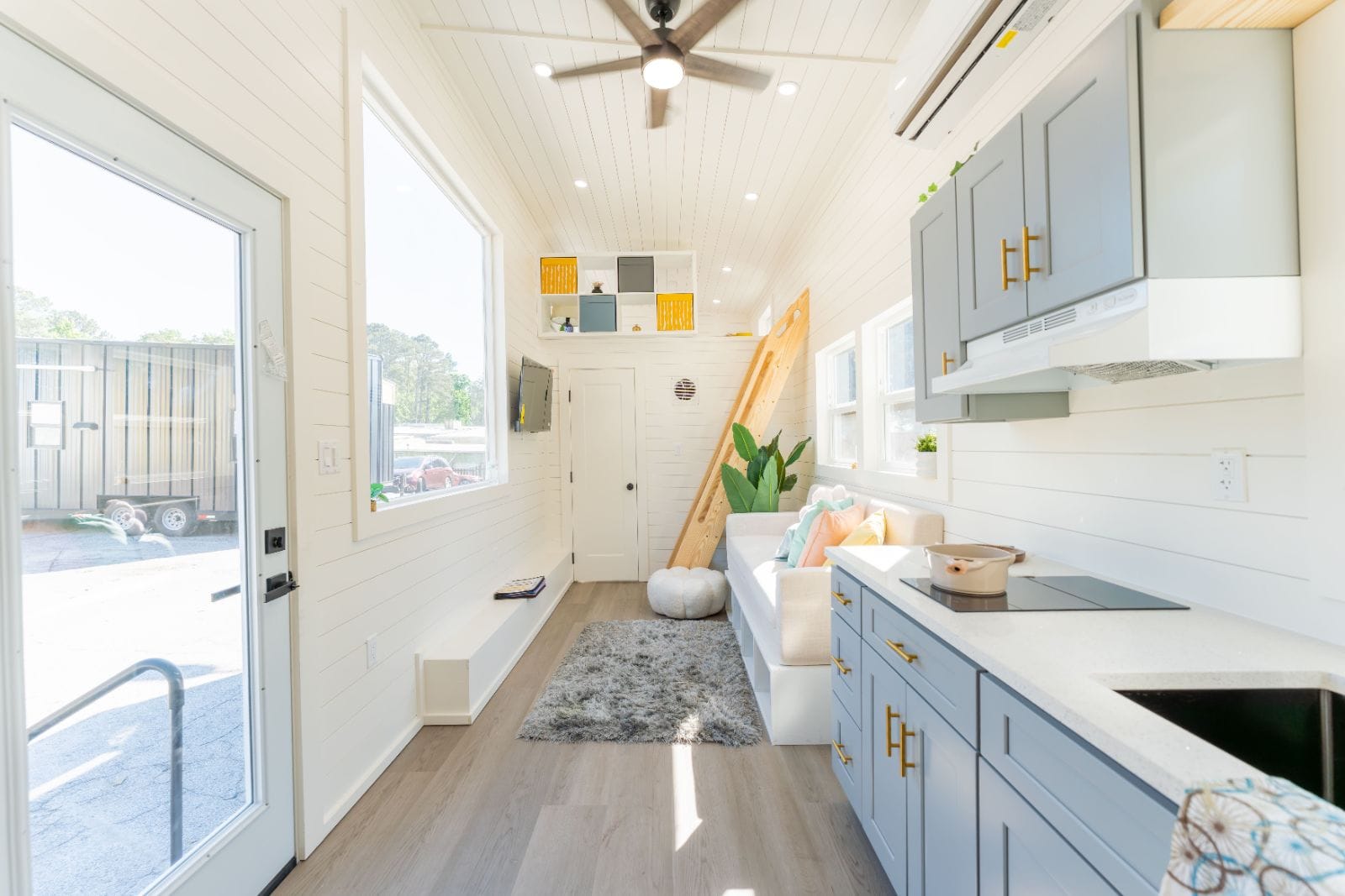32’ Tiny Home featuring efficient layout, full kitchen, complete bathroom, first-floor bedroom, and dual lofts - Image 2