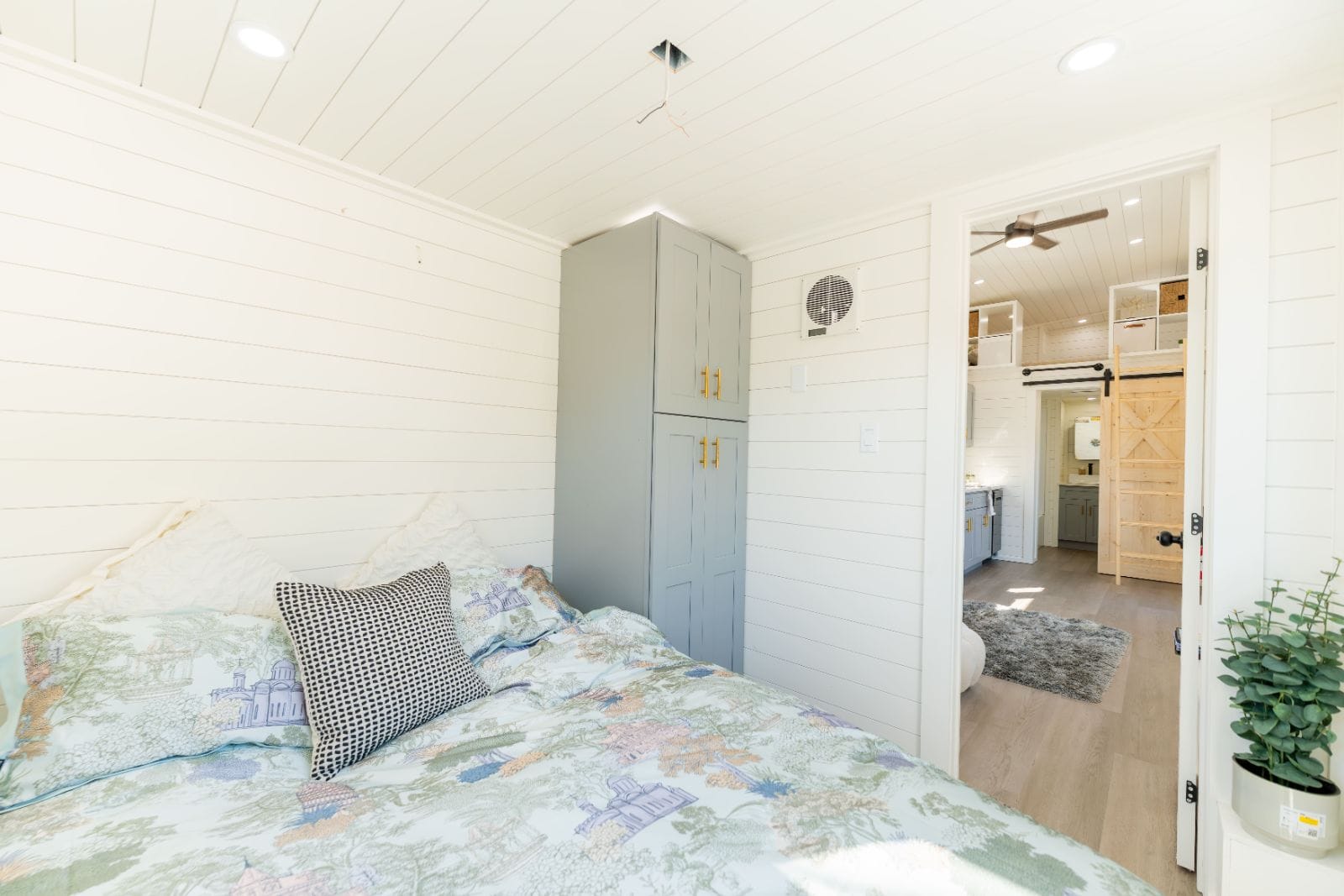 32’ Tiny Home featuring efficient layout, full kitchen, complete bathroom, first-floor bedroom, and dual lofts - Image 5