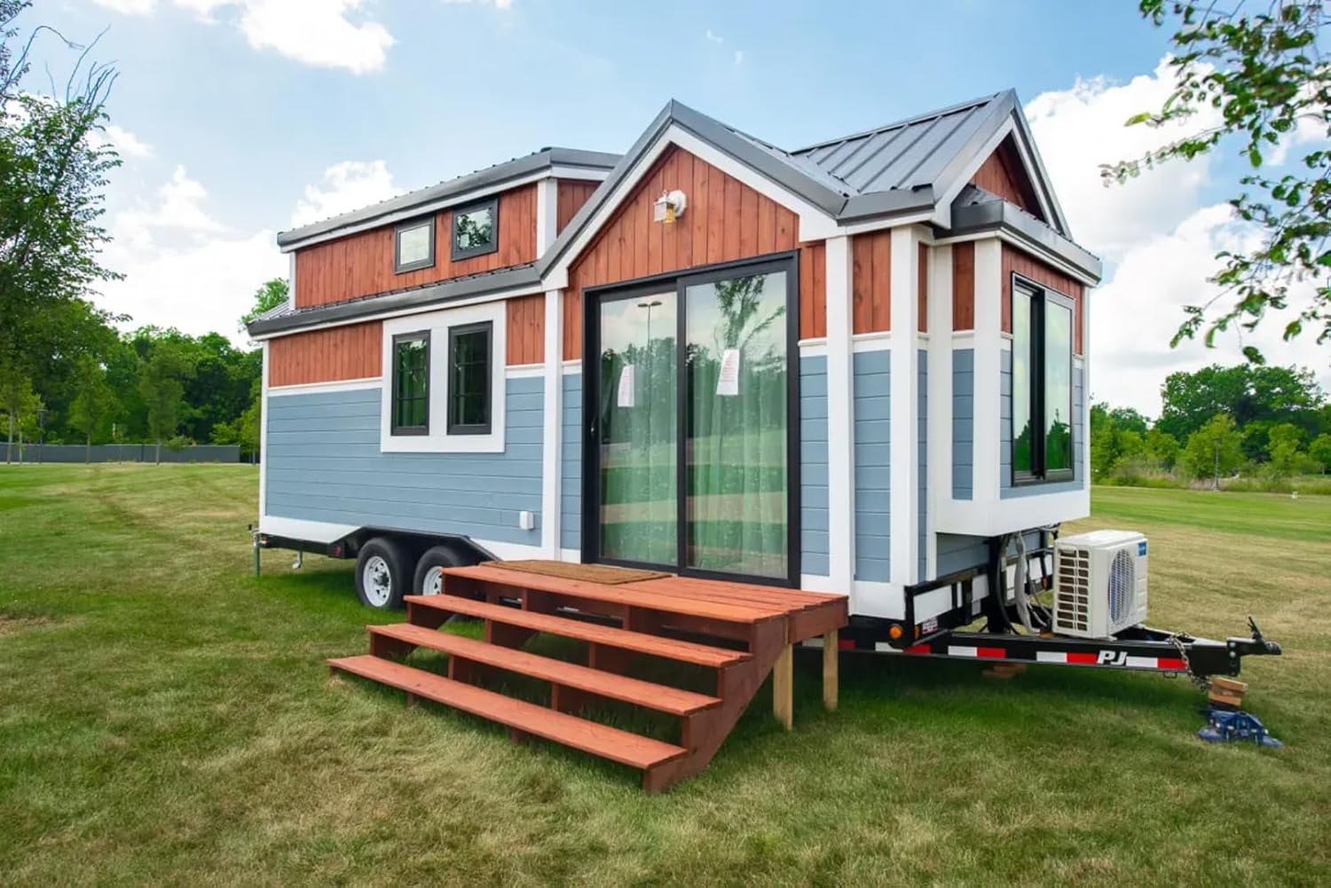 Two-Story Cedar Accent Tiny Home on Wheels – Glass Windows, Dual-Tone Siding & Trailer Mount