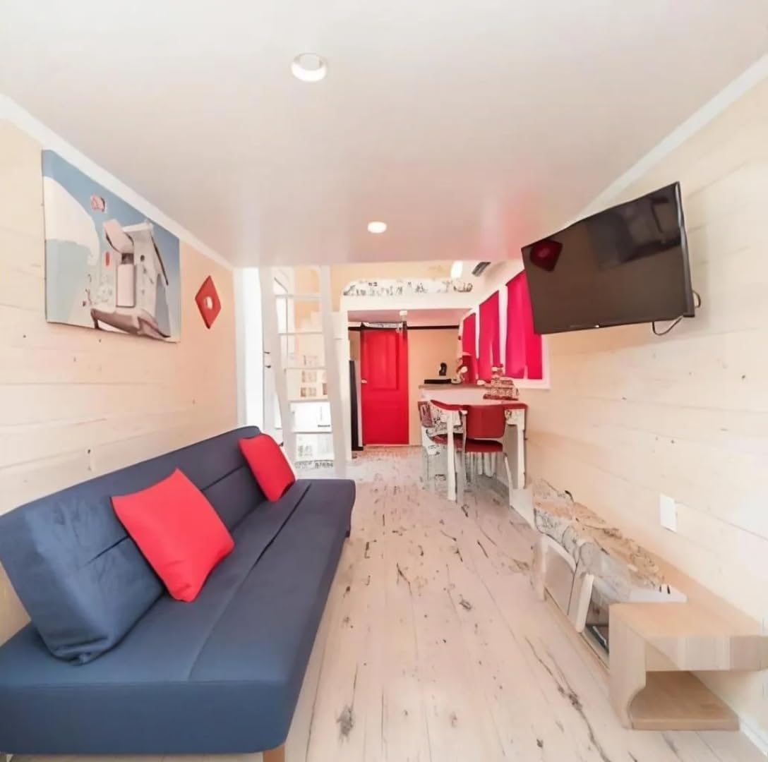 White & Cedar Tiny Home with Metal Roof – Porch, Large Windows, and Covered Entryway - Image 4