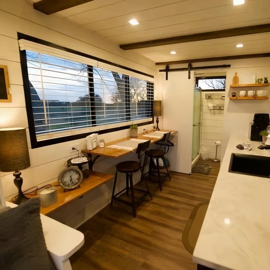 Gray Tiny Home on Wheels with Orange Door – Dual Axle Trailer, Metal Roof, and Dormer Window - Image 3