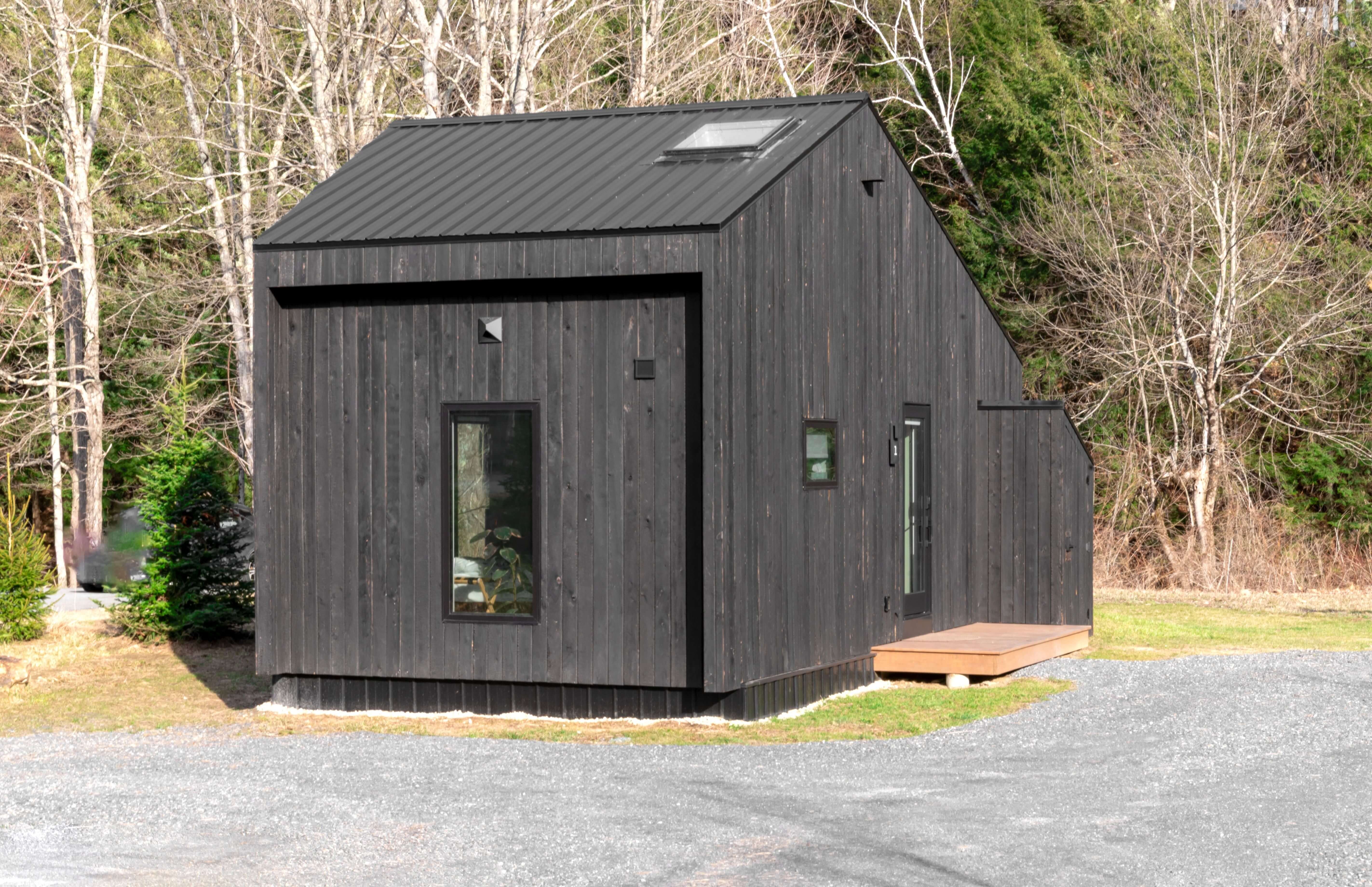 Minnesota tiny house community with small homes, shared amenities, and scenic landscape