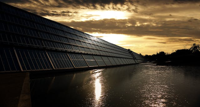 Solar panels installed on tiny house roof with battery storage system for off-grid living